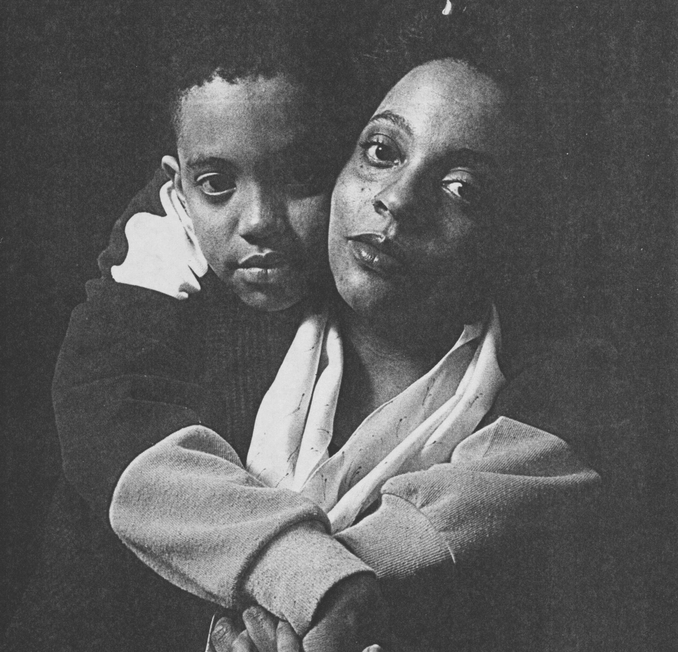 A black and white portrait of Elizabeth Horton Sheff and her son, Milo.