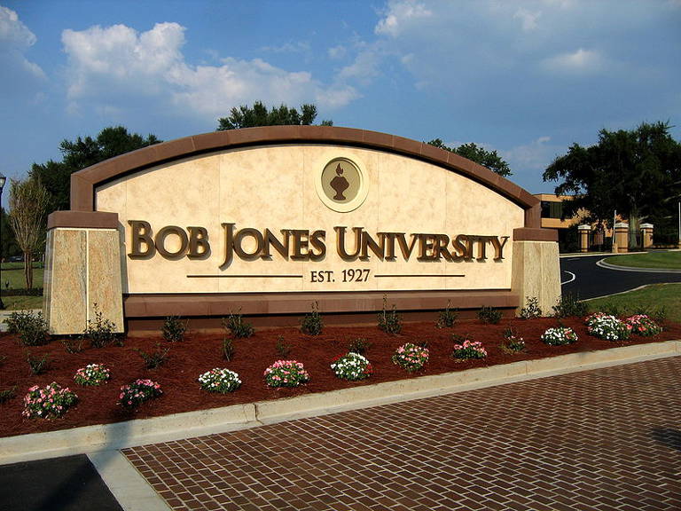 Color photo of the Bob Jones University sign at the entrance on Wade Hampton Boulevard in Greenville, South Carolina.