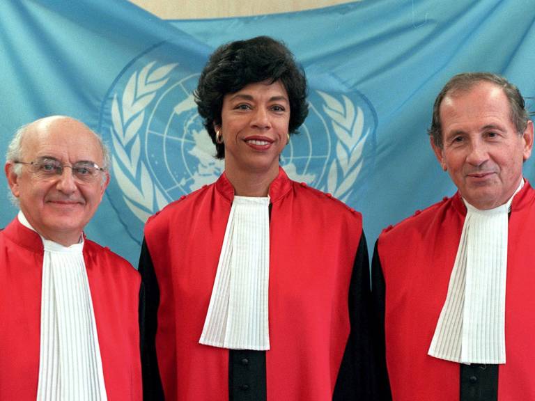 Gabrielle Kirk McDonald (center) stands with Antonio Cassese (left) and Claude Jorda (right) of the International Criminal Tribunal for the Former Yugoslavia in November 1999.