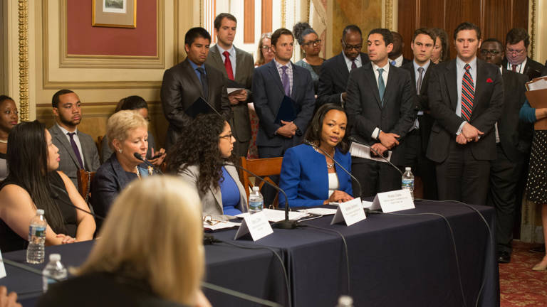 Kristen Clarke, seated, speaks during a congressional hearing alongside MALDEF Regional Counsel Andrea Senteno in the In the U.S. Capitol Building’s Lyndon B. Johnson Room.