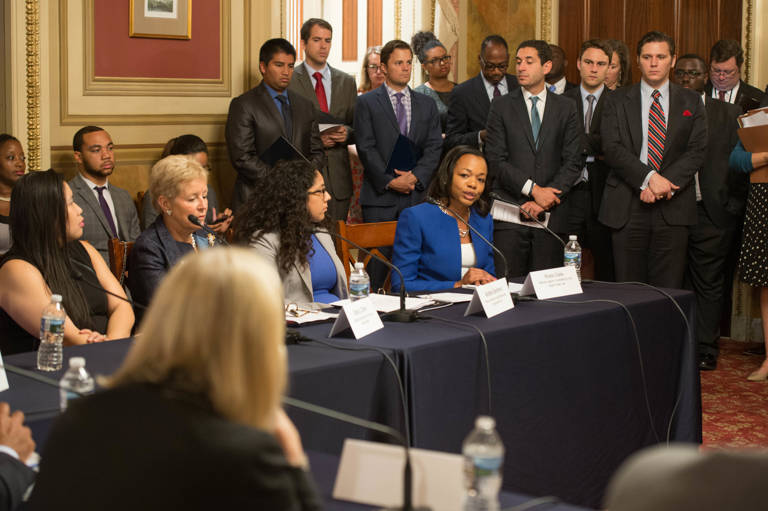 Kristen Clarke, seated, speaks during a congressional hearing alongside MALDEF Regional Counsel Andrea Senteno in the In the U.S. Capitol Building’s Lyndon B. Johnson Room.
