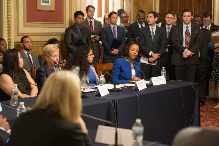 Kristen Clarke, seated, speaks during a congressional hearing alongside MALDEF Regional Counsel Andrea Senteno in the In the U.S. Capitol Building’s Lyndon B. Johnson Room.