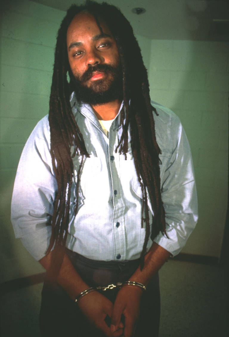 Color photo of Mumia Abu-Jamal taken on December 13, 1995, in prison.