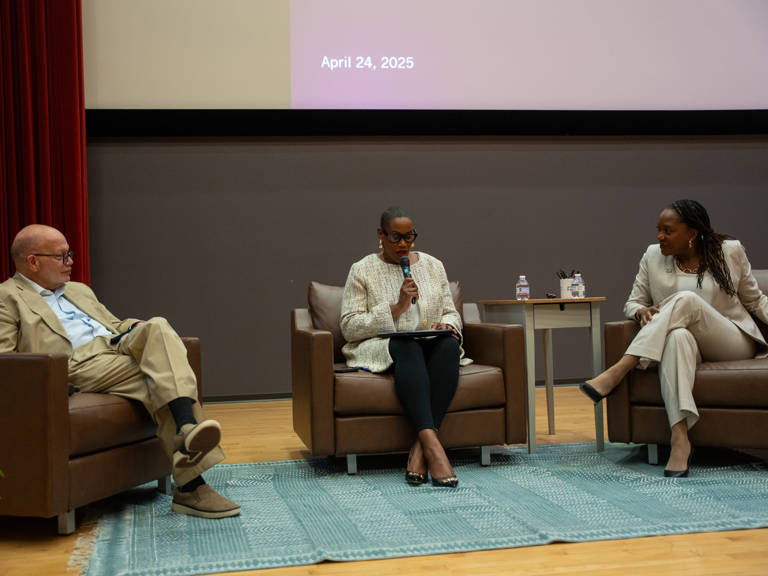 Janai Nelson, Meredith Clark, and Theodore M. Shaw seated onstage during the keynote conversation at the SOHP Spring Symposium on April 24, 2025.